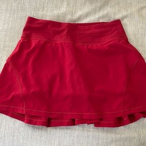 Lululemon red skirt skirt. Size 2 tall.  Worn twice. Excellent condition.